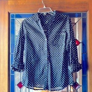 Navy blue with white polka dot blouse.